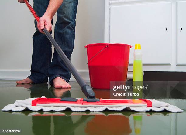 man wiping the floor - mop stock pictures, royalty-free photos & images