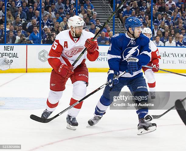 Tyler Johnson of the Tampa Bay Lightning skates against Niklas Kronwall of the Detroit Red Wings during the third period of Game Two of the Eastern...