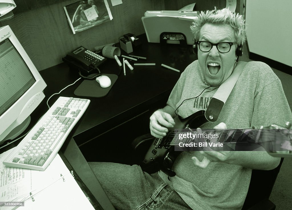 Office Worker Playing Guitar