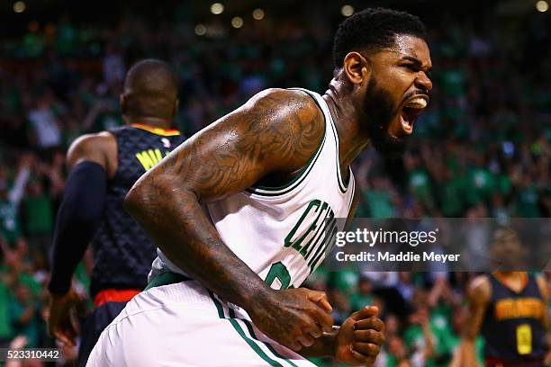 Amir Johnson of the Boston Celtics reacts after scoring against the Atlanta Hawks during the first quarter of Game Three of the Eastern Conference...
