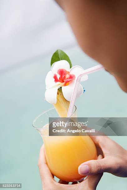 woman with tropical drink - bandos foto e immagini stock