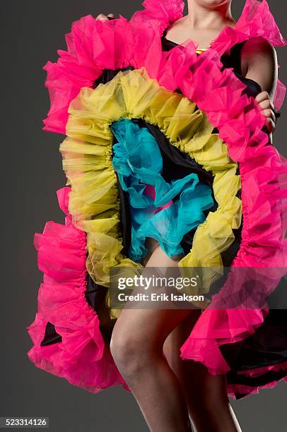 can-can dancer lifting her skirt - petticoat stock-fotos und bilder