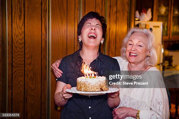 woman getting a birthday cake - happy birthday vintage fotografías e imágenes de stock