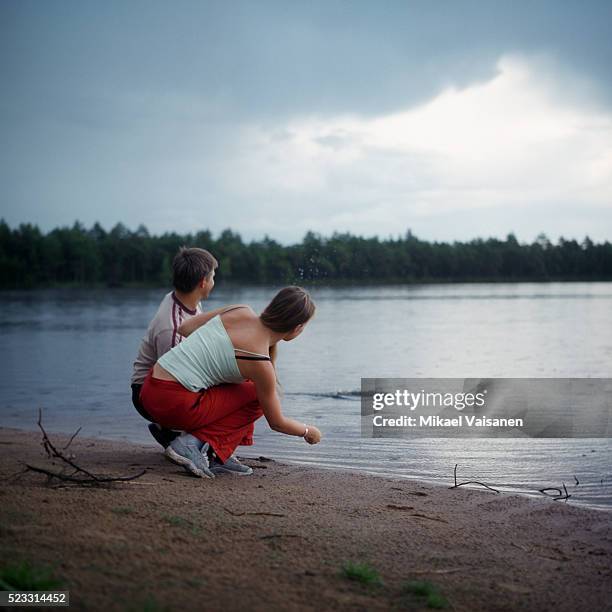 Skip Rocls 147 Skipping Rocks At Lake Stock Photos, High-Res Pictures, and Images ...