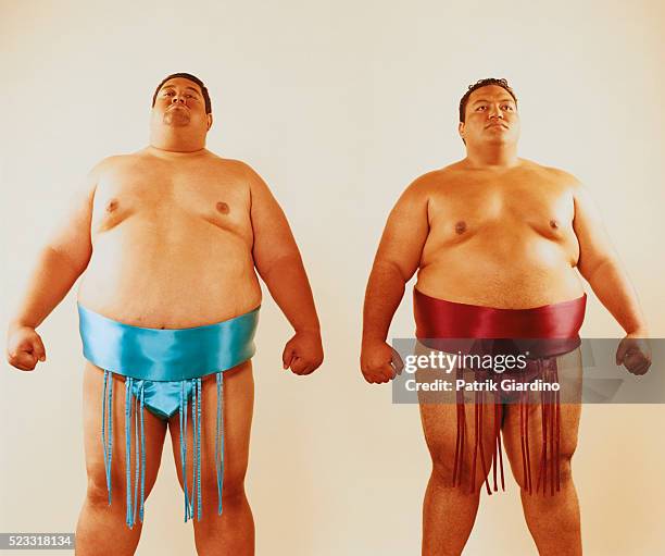 proud sumo wrestlers - sumo wrestling stock pictures, royalty-free photos & images