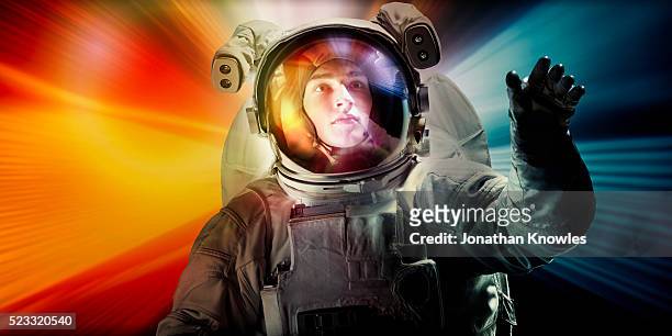 astronaut floating in space - astronaut helmet stock pictures, royalty-free photos & images