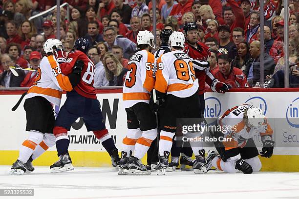 Jakub Voracek of the Philadelphia Flyers gets up after a boarding call on Jason Chimera of the Washington Capitals in the third period of the Flyers...