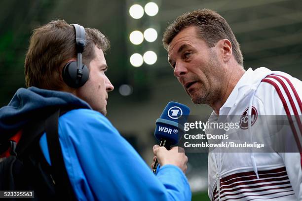 Head coach Dieter Hecking of Nuernberg is interviewed after the Bundesliga match between VfL Borussia Moenchengladbach and 1. FC Nuernberg at...