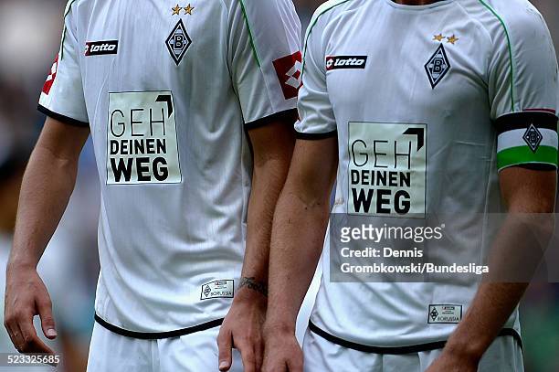 Shirts displaying the 'Geh deinen Weg' logo are seen during the Bundesliga match between VfL Borussia Moenchengladbach and 1. FC Nuernberg at...