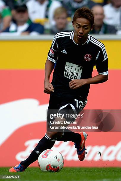 Hiroshi Kiyotake of Nuernberg controls the ball during the Bundesliga match between VfL Borussia Moenchengladbach and 1. FC Nuernberg at Borussia...