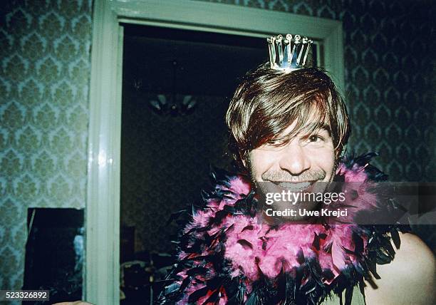 man with feather boa and crown - festa di addio al celibato foto e immagini stock