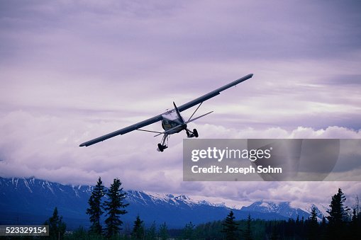 Single-Engine Plane in Flight Single-Engine Plane in Flight