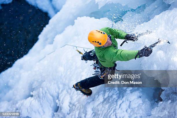 ice climber - eisklettern stock-fotos und bilder