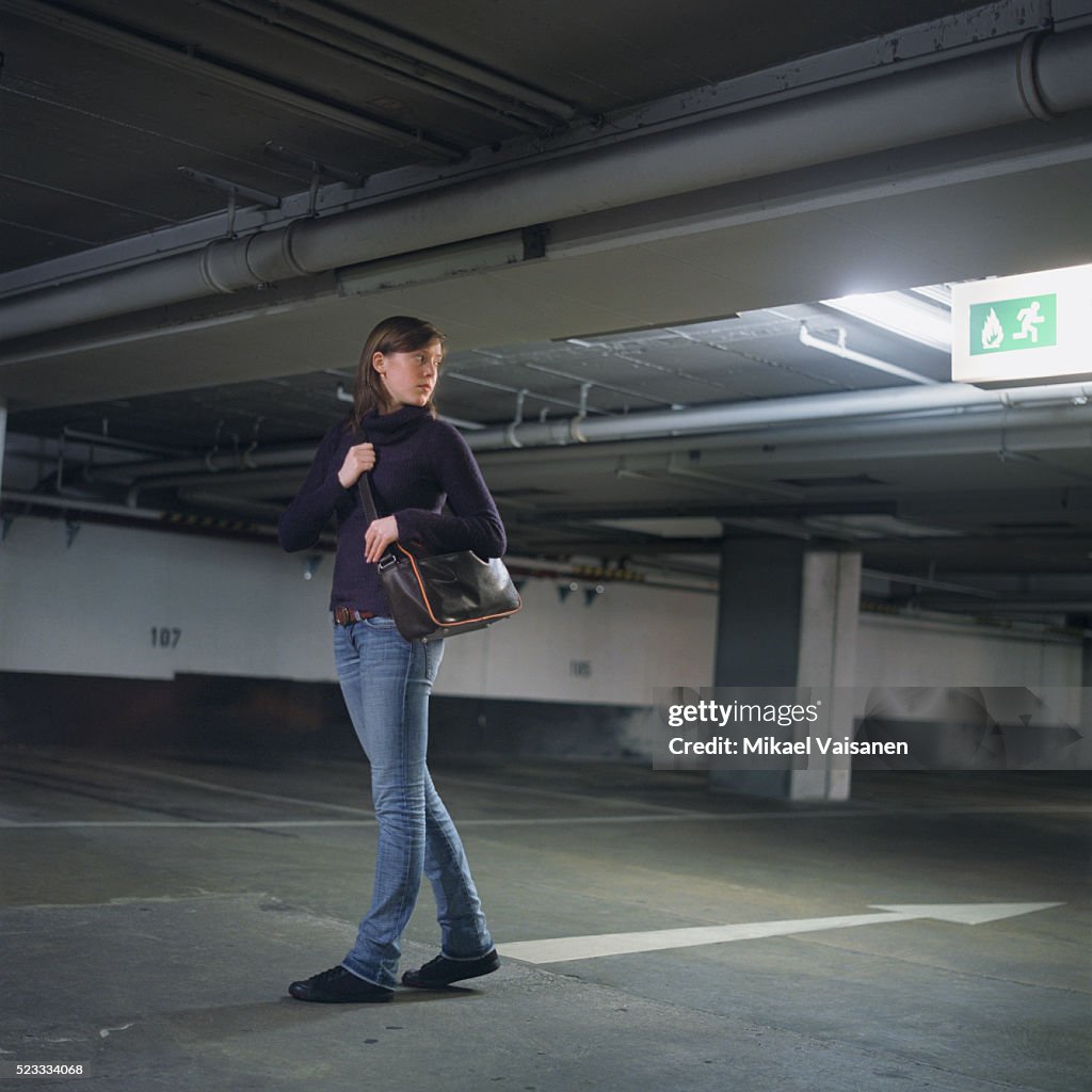 Girl Walking Alone in Parking Garage