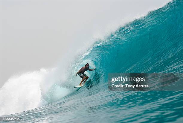 surfer in a tube - vintage surf stock pictures, royalty-free photos & images