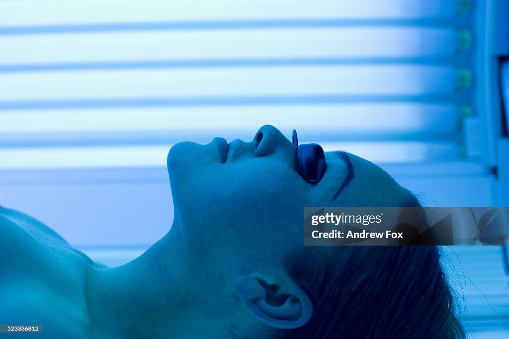 Woman in a Tanning Bed