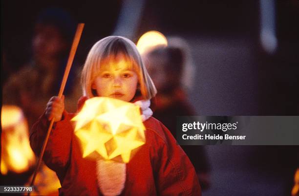 little girl with a lantern - laternenumzug stock-fotos und bilder
