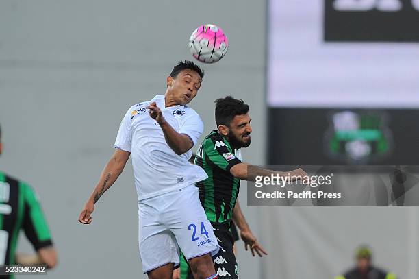 Luis Muriel Unione Calcio Sampdoria's forward and national team of Colombia fights for the ball with Francesco Magnanelli Sassuolo's midfielder...