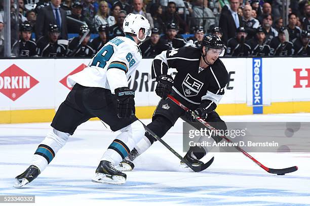 Vincent Lecavalier of the Los Angeles Kings handles the puck against Melker Karlsson of the San Jose Sharks in Game Five of the Western Conference...