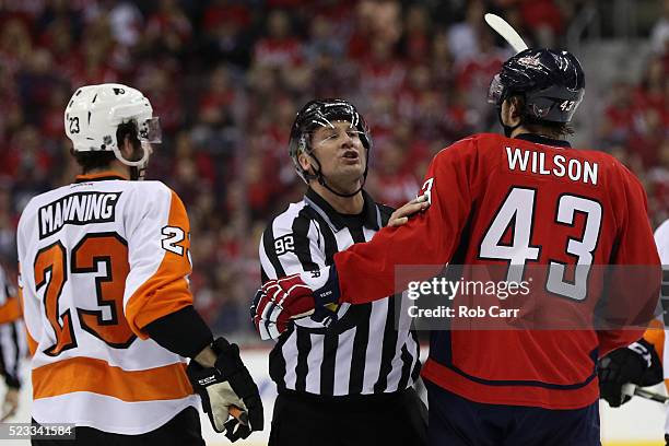 Brandon Manning of the Philadelphia Flyers and Tom Wilson of the Washington Capitals are seperated duirng Game Five of the Eastern Conference...