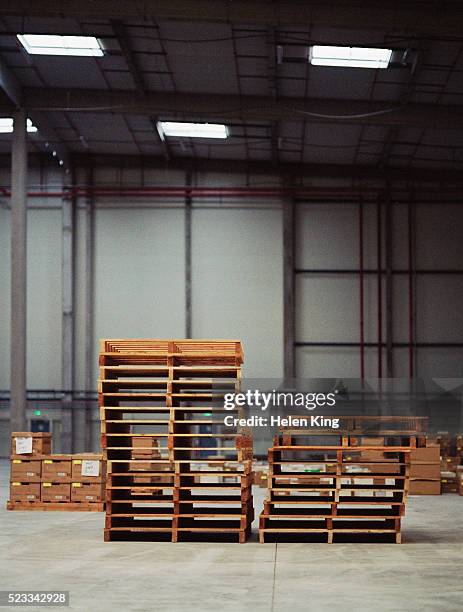 pallets in warehouse - pallet stock pictures, royalty-free photos & images