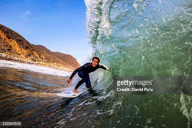 man surfing, malibu, california, usa - malibu foto e immagini stock