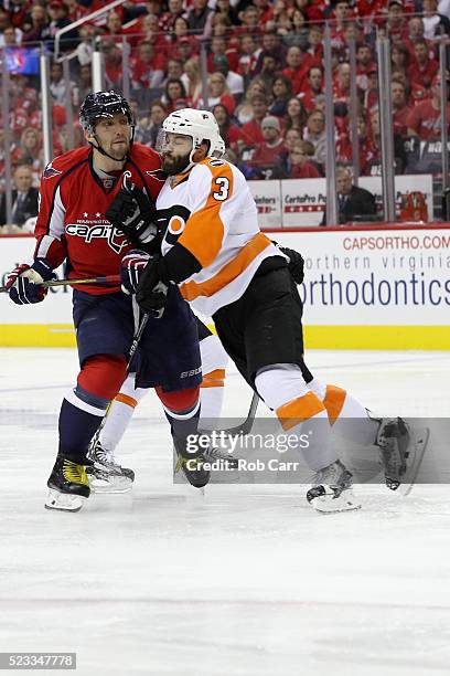 Radko Gudas of the Philadelphia Flyers checks Alex Ovechkin of the Washington Capitals during Game Five of the Eastern Conference Quarterfinals...