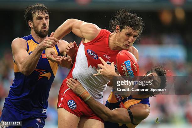 Kurt Tippett of the Swans is tackled during the round five AFL match between the Sydney Swans and the West Coast Eagles at Sydney Cricket Ground on...
