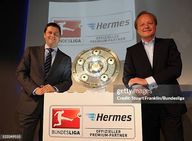 Christian Seifert, chairman of business for the DFL and Hanjo Schneider, CEO of Hermes europe at the announcement of Hermes as the new DFL premium...