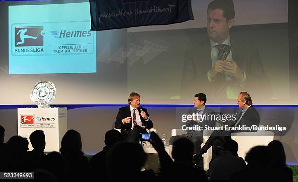 Christian Seifert, chairman of business for the DFL and Hanjo Schneider, CEO of Hermes europe at the announcement of Hermes as the new DFL premium...