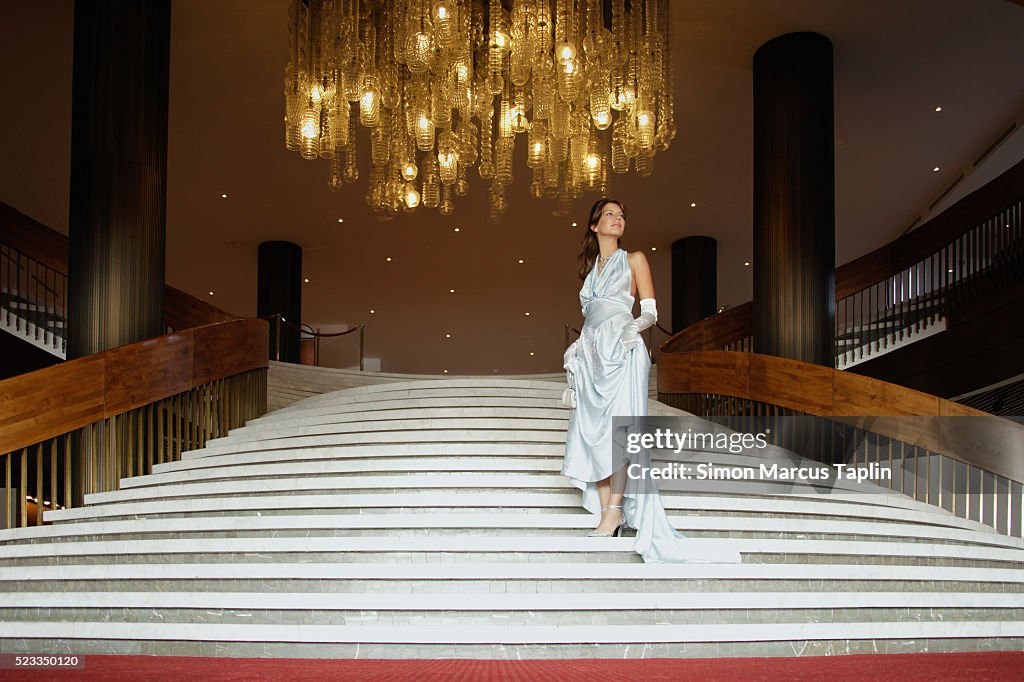 Woman Descending Stairwell