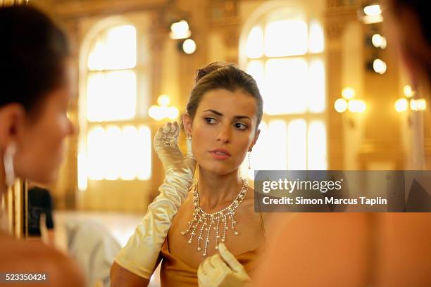 woman preparing for party - evening glove ストックフォトと画像