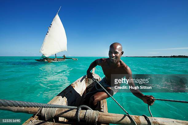 sailing boats off the coast of zanzibar. tanzania. africa. - zanzibar 個照片及圖片檔