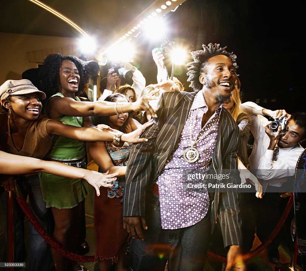 Fans Touching Celebrity at Premiere