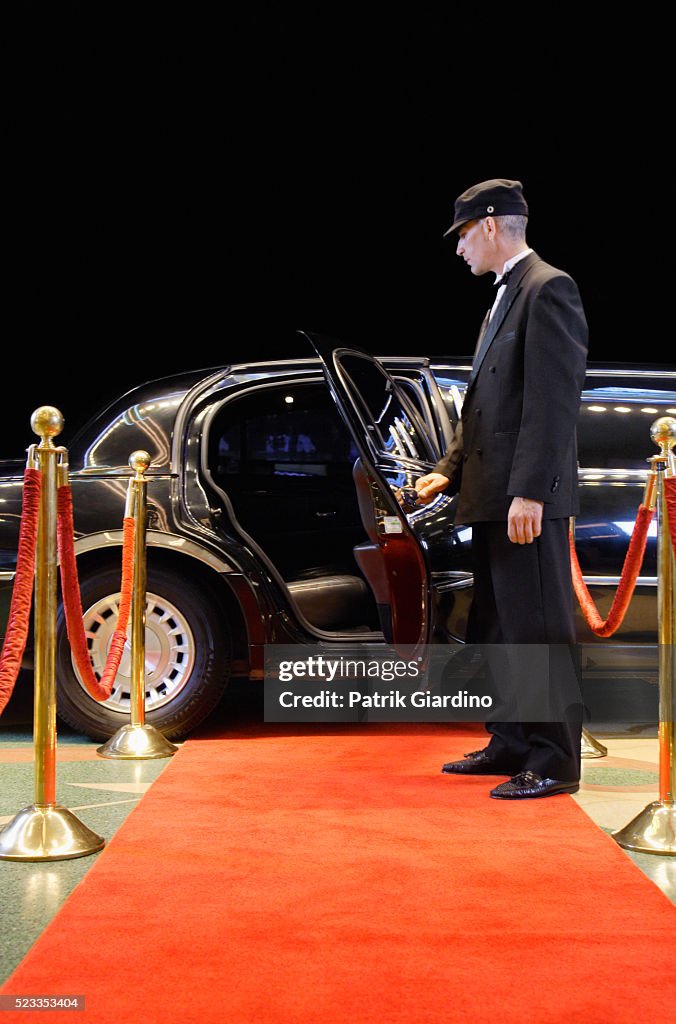 Driver Holding Limo Door Open