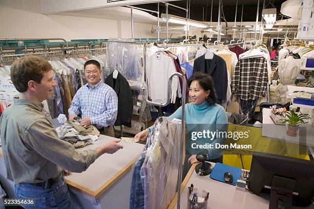 entrepreneurs working - dry cleaning shop stock pictures, royalty-free photos & images