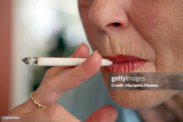 woman smoking - sydney smoke stock pictures, royalty-free photos & images