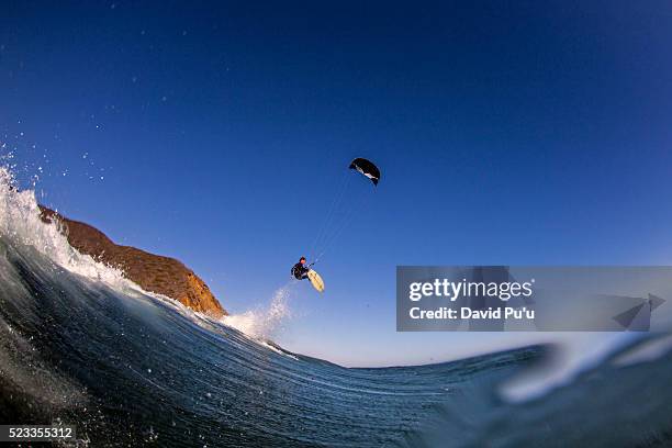man kitesurfing - kite surfing stock pictures, royalty-free photos & images