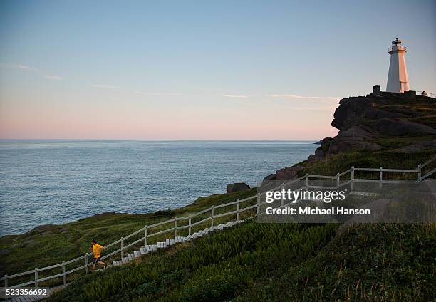 man running up stairs, st. john's, newfoundland and labrador, canada - セントジョンズ ストックフォトと画像