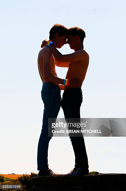 Two Gay Boys Being Intimate With Each Other High-Res Stock Photo - Getty  Images