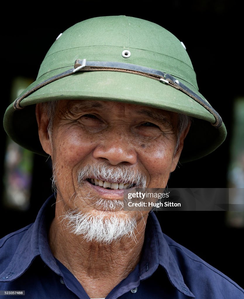 Vietnamese man wearing traditional hat. Vietnam