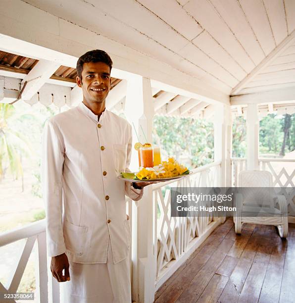 portrait of waiter with tray - sri lankan ethnicity stock pictures, royalty-free photos & images