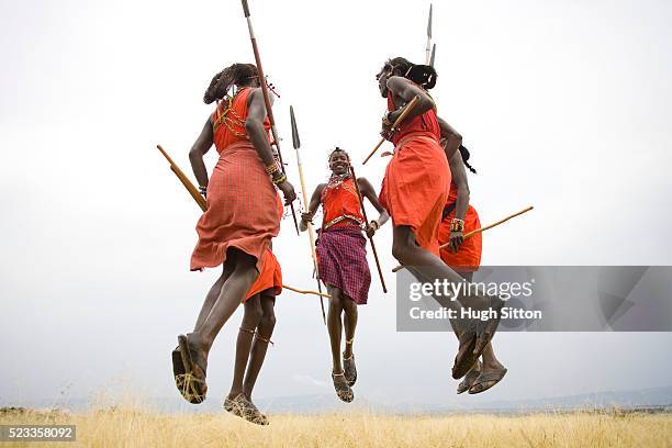 maasai tribesmen - masai warrior stockfoto's en -beelden