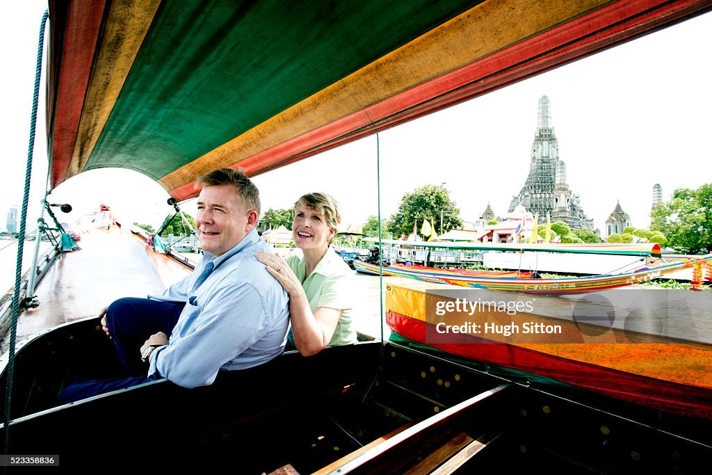 Mature couple in tourboat sightseeing, Bangkok, Thailand