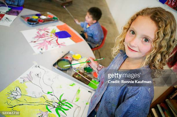 girl painting - preschool art stock pictures, royalty-free photos & images