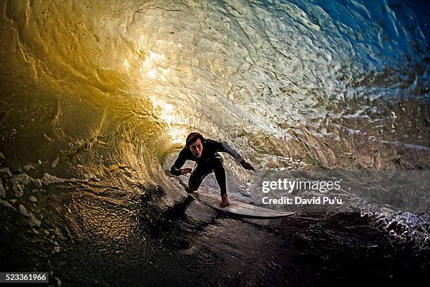 man surfing on big wave - vintage surf stock pictures, royalty-free photos & images