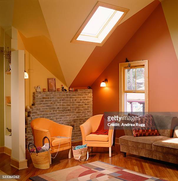 bold colors emphasizing finished attic ceiling - home design colors stockfoto's en -beelden