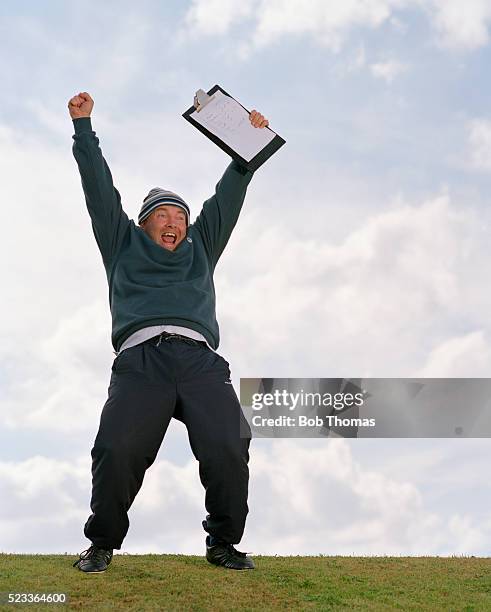 coach celebrating victory - coach yelling stock pictures, royalty-free photos & images