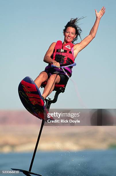 water skier jumping an air chair on lake mead - waterskiing stock pictures, royalty-free photos & images
