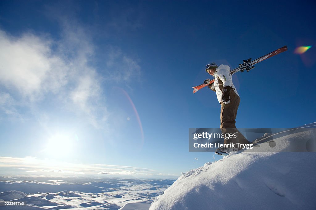 Skier Standing on Snow